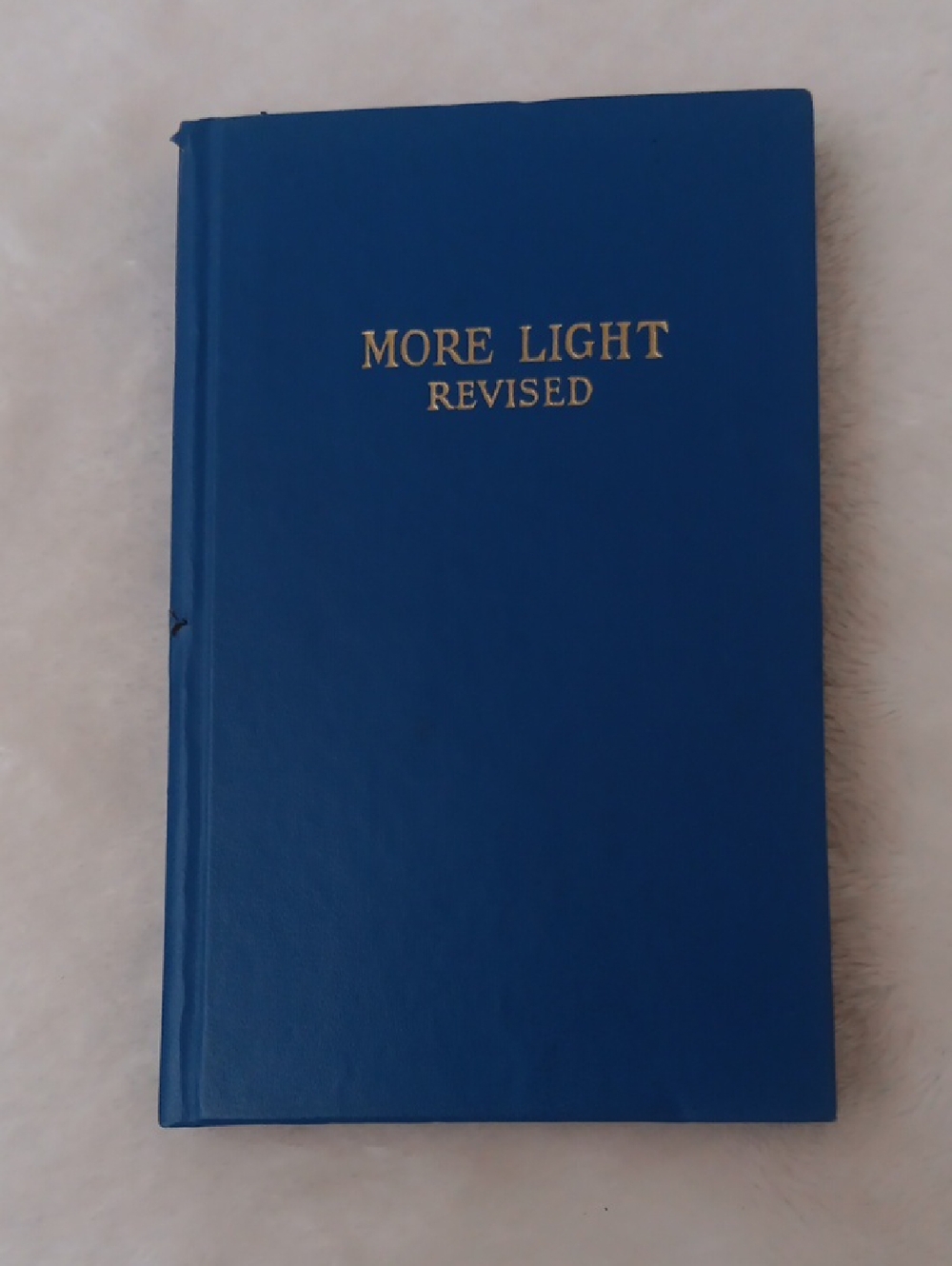 More Light Revised Blue Hardcover Book